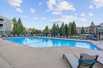 Sparkling outdoor pool with sundeck